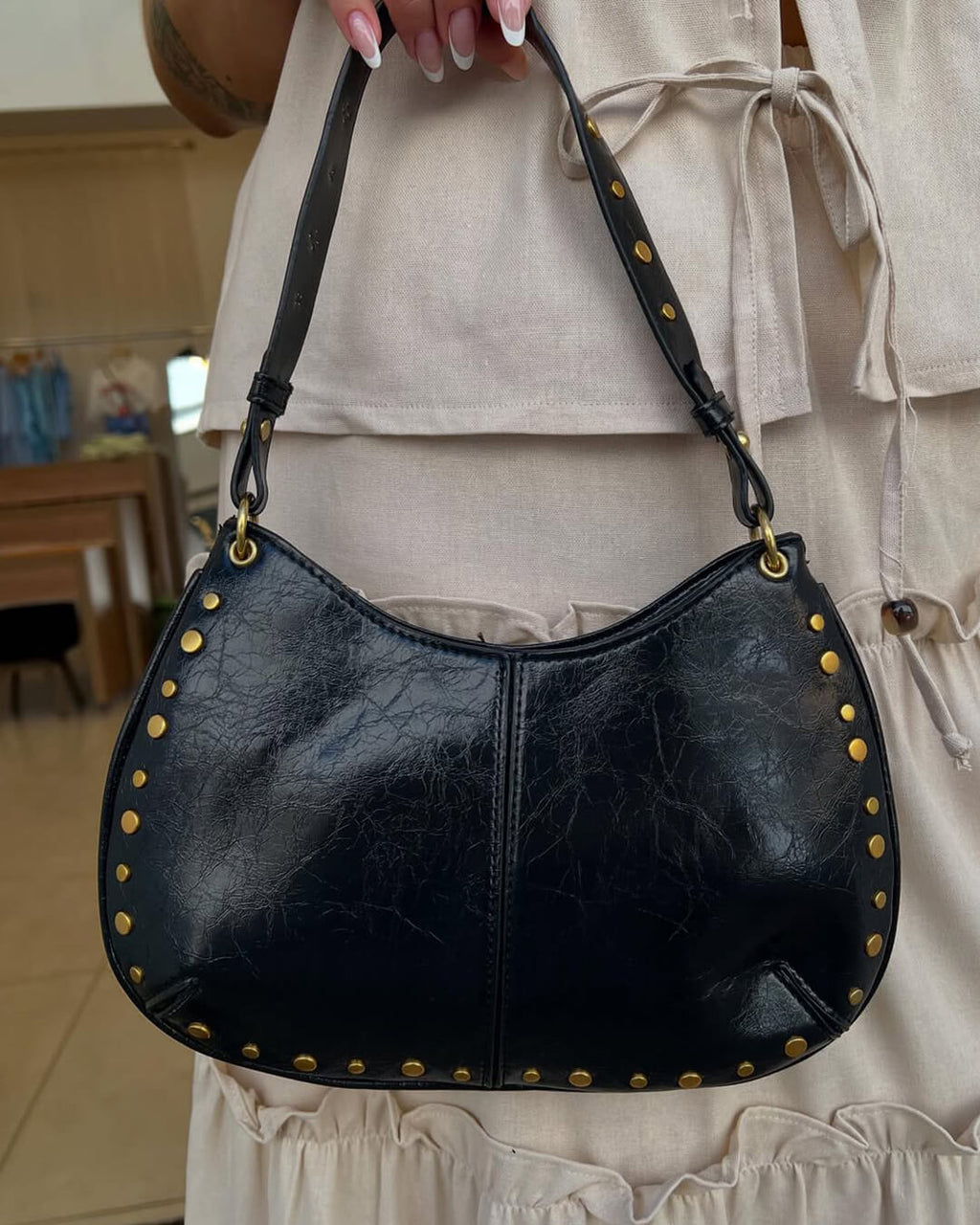 Claudia Tas met Gouden Details